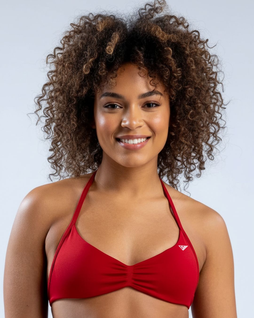 BD WEAR Alia halter sports bra with supportive design and adjustable straps, shown in a sleek, breathable fabric.