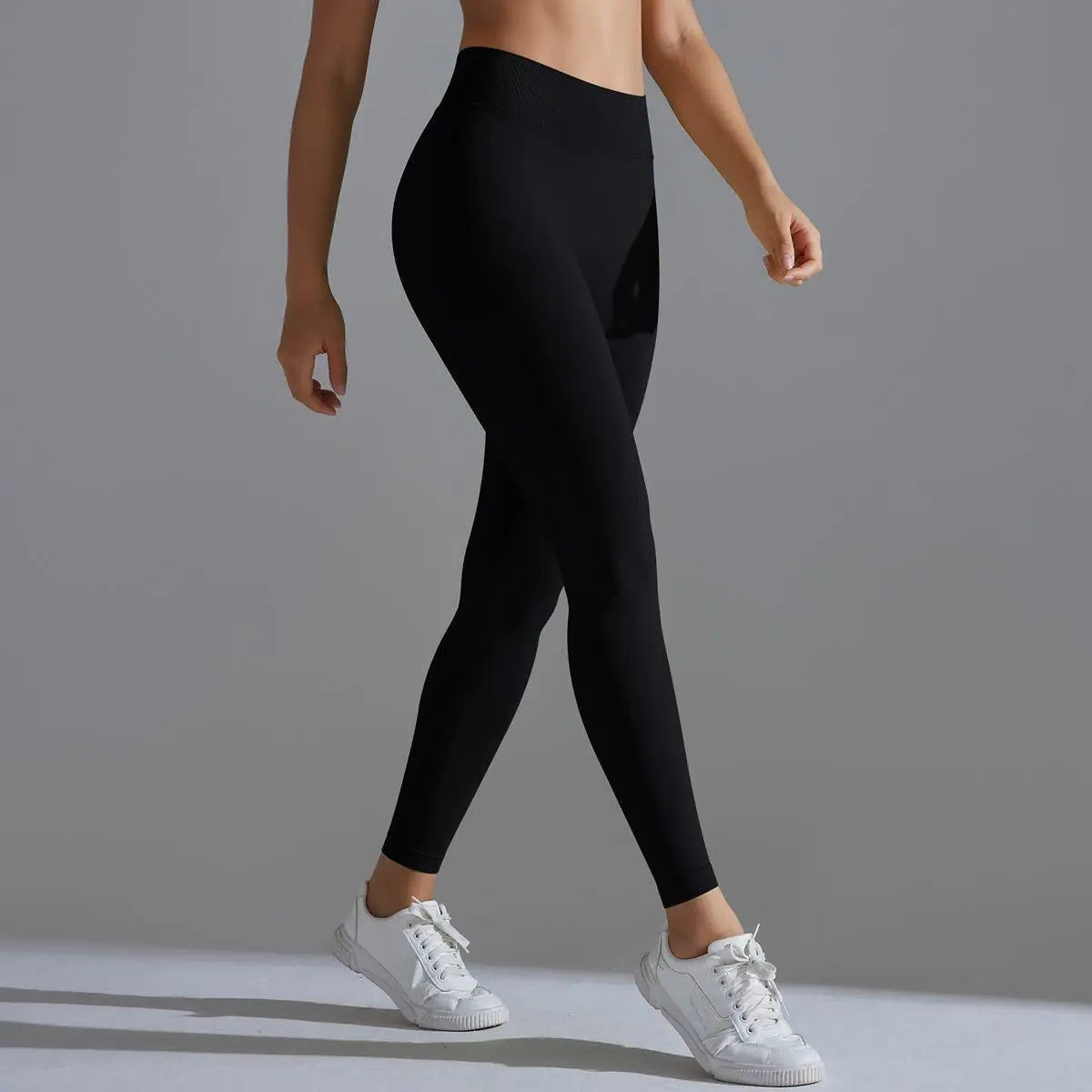 BD WEAR Astra Sculpt leggings featuring high-waisted design and stretchy fabric, shown on a model with a sleek, athletic fit.