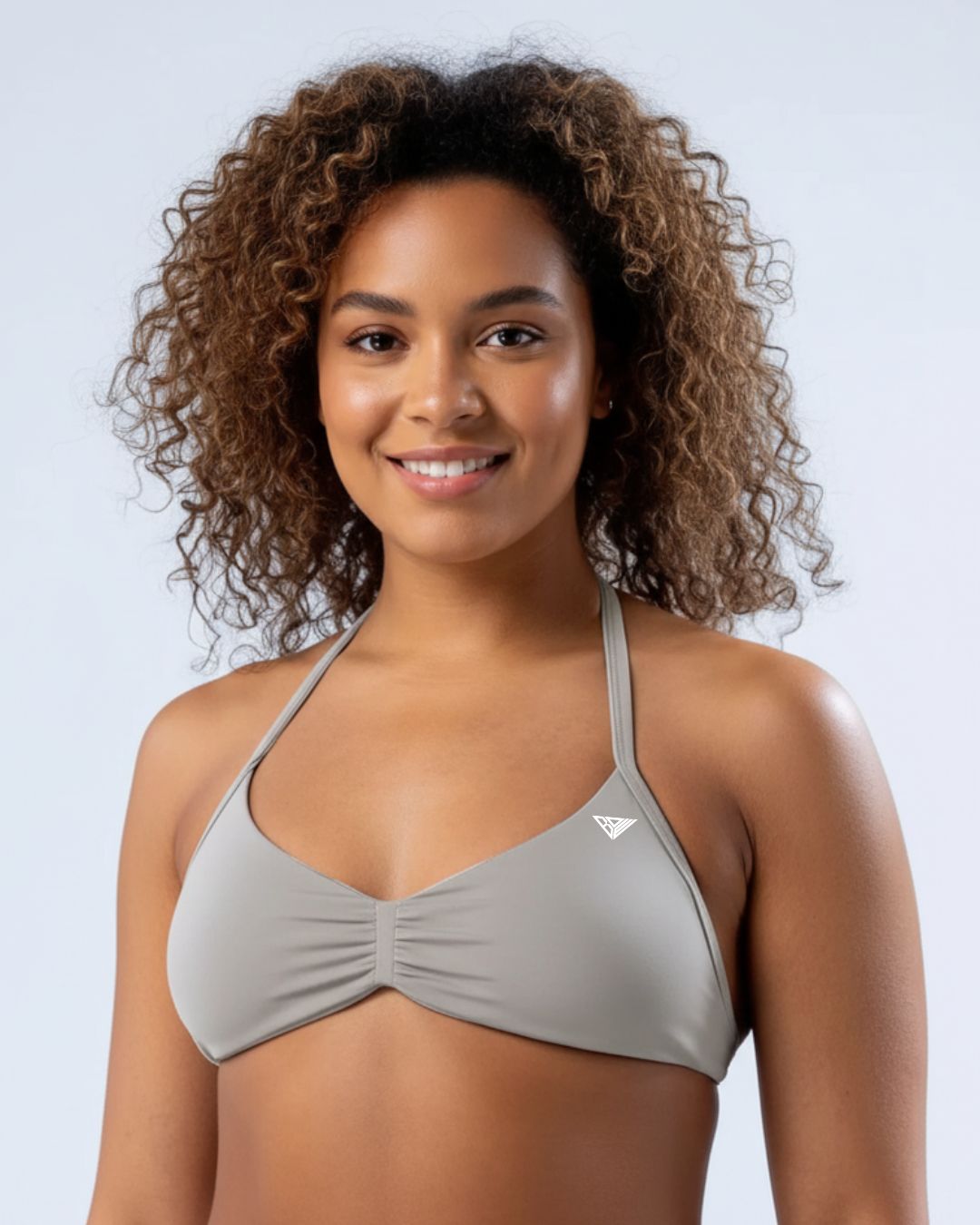 BD WEAR Alia Halter Sports Bra shown in black with adjustable straps, designed for active wear and comfortable support.