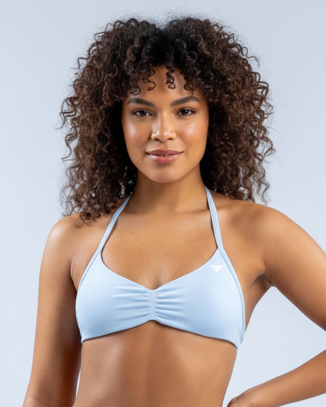 BD WEAR Alia Halter Sports Bra in black, featuring supportive halter design and breathable fabric for activewear.