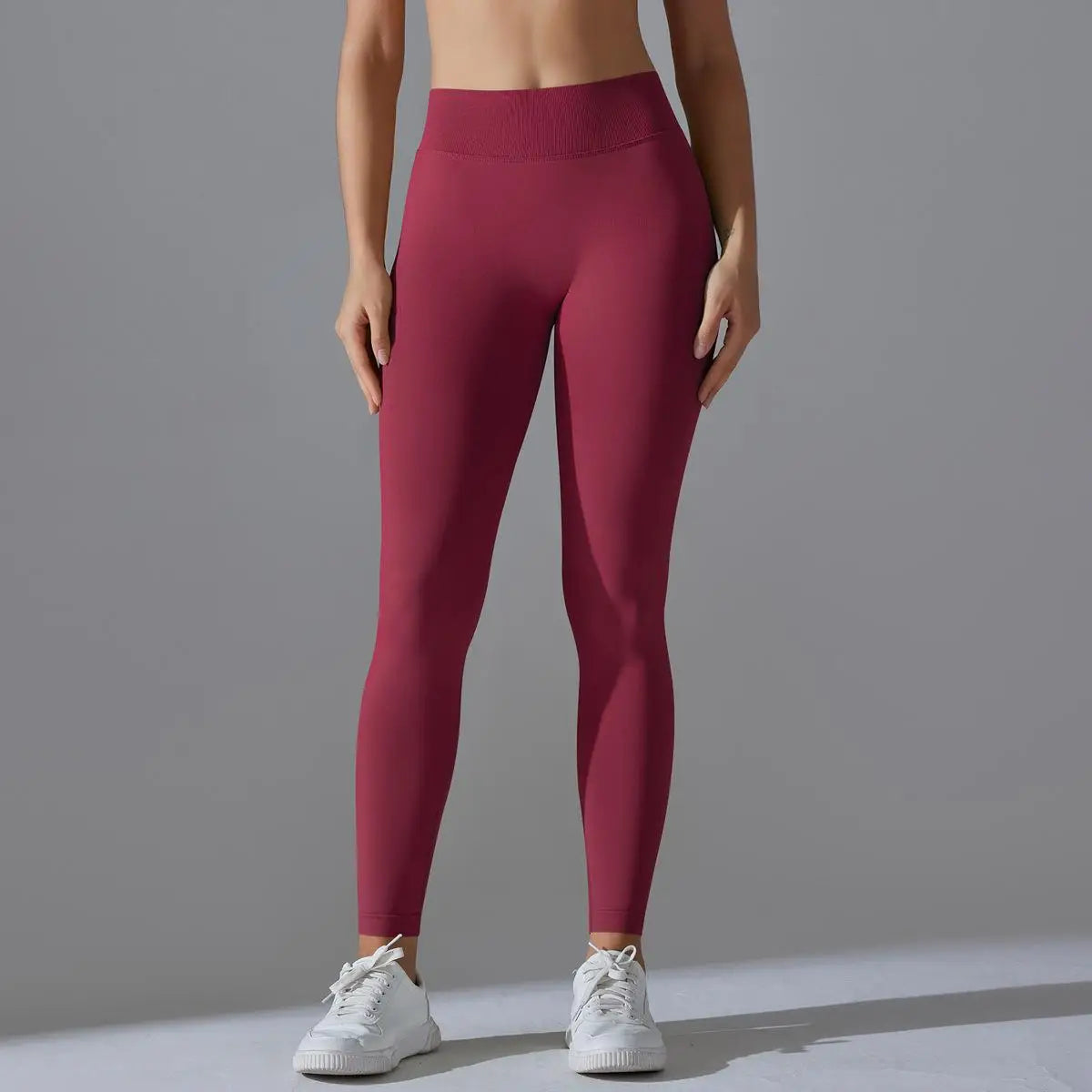 Astra Sculpt Leggings by BD WEAR featuring high-waisted design, seamless fit, and black stretchy fabric for activewear or casual wear.