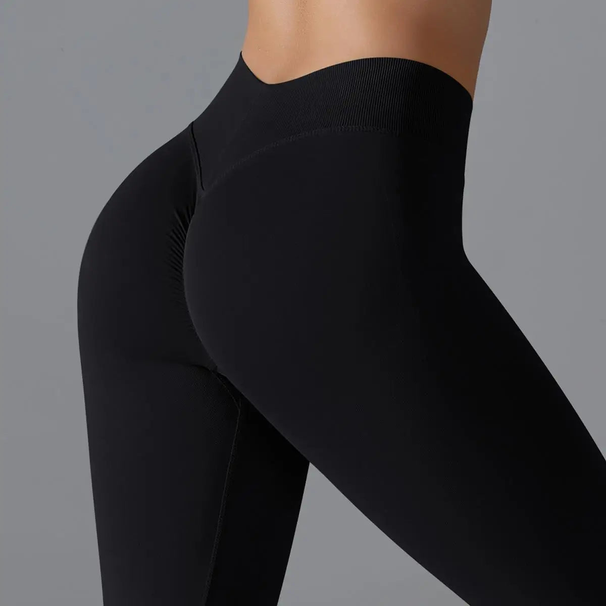 A pair of BD WEAR Astra Sculpt leggings in black, showcasing a snug fit and high-waisted design with subtle branding.